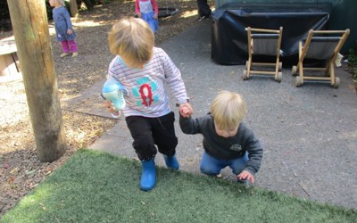happy girls reading books at daycare